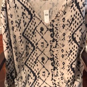 Beige and black sweater